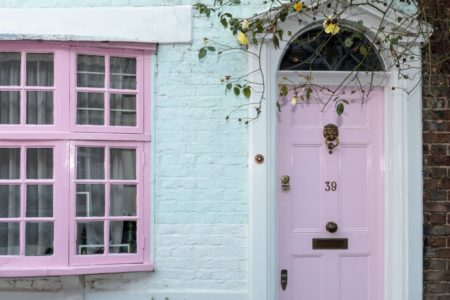 door knocker on pink door